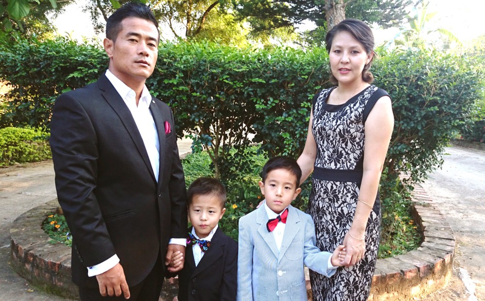 Cheryl Kire Achumi with family